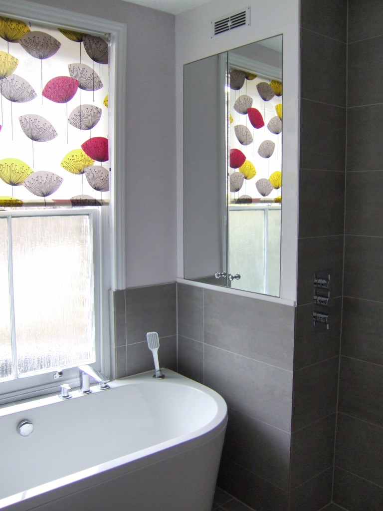 Bespoke airing cupboard with recessed mirror doors Richmond Bathrooms