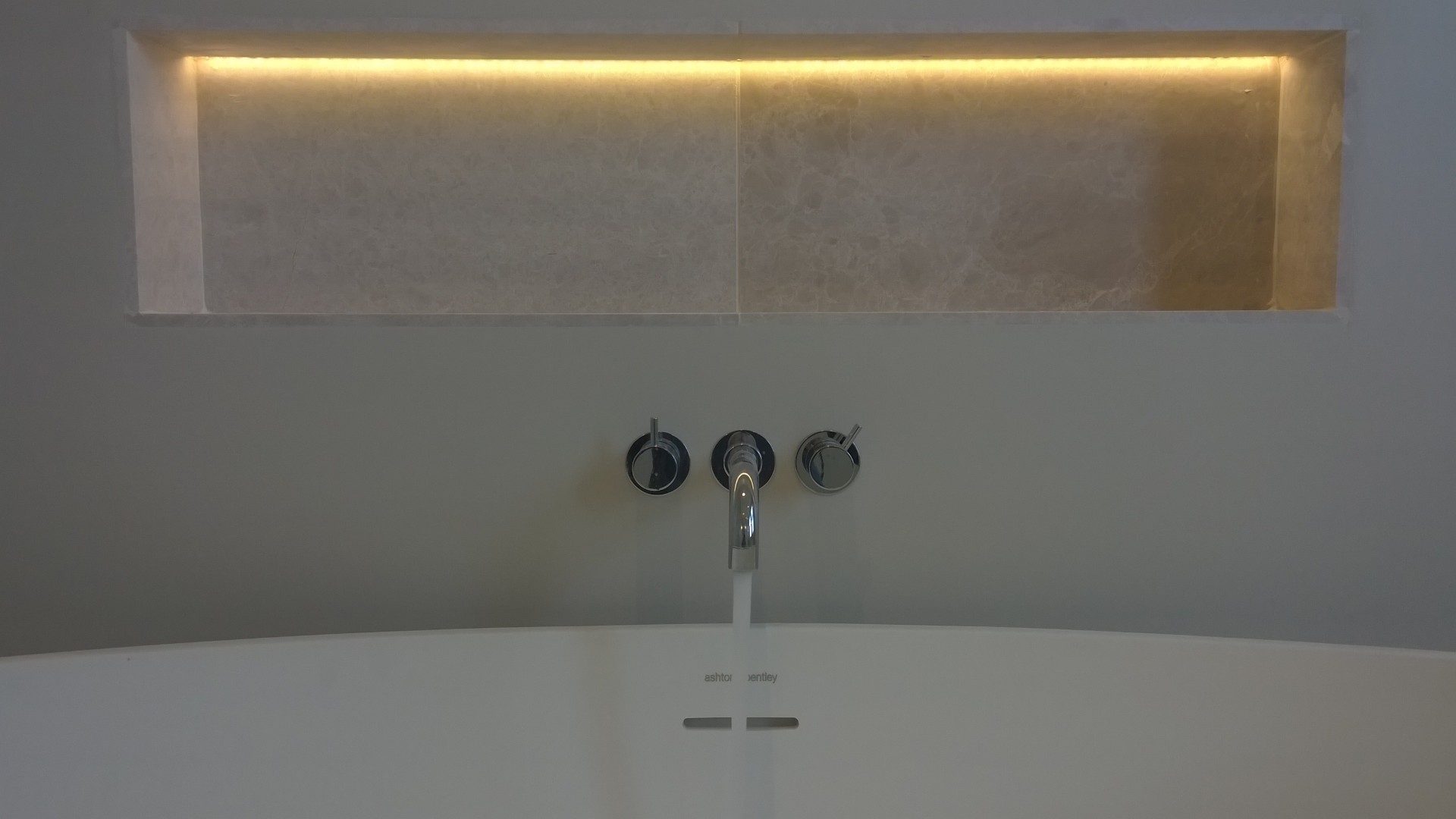 Recessed shelf with an LED ligting strip