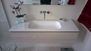 A wall hung basin unit with one drawer