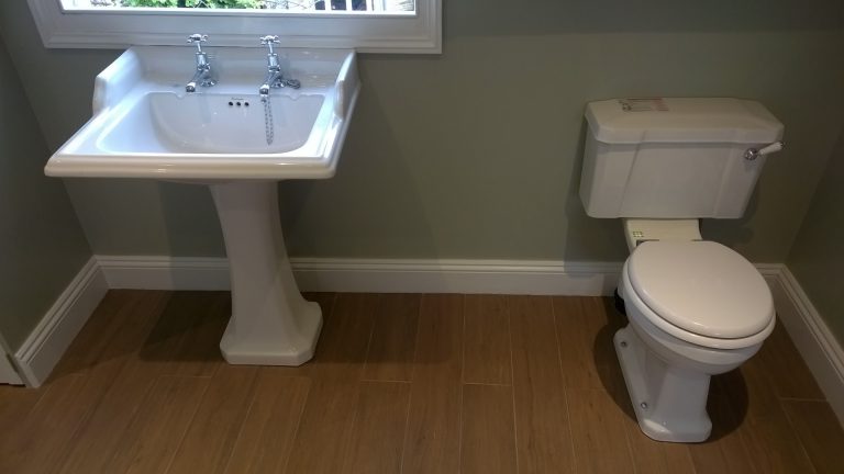 Bathroom floor with engineered natural wooden flooring